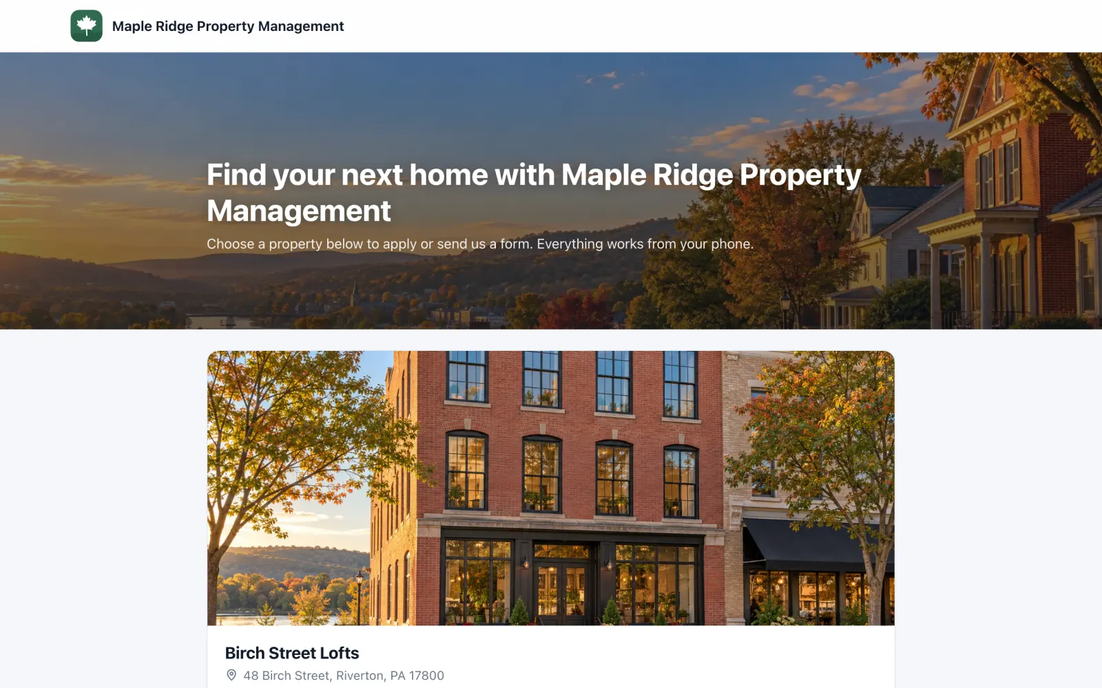The demo company's applicant site, with its maple leaf logo, an autumn banner photo and a property card for Birch Street Lofts
